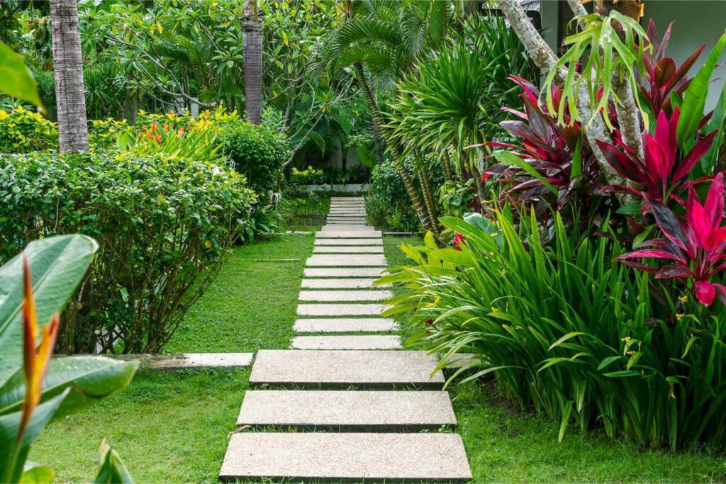 well-kept-tropical-garden-with-a-path-after-the-ra-1.jpg